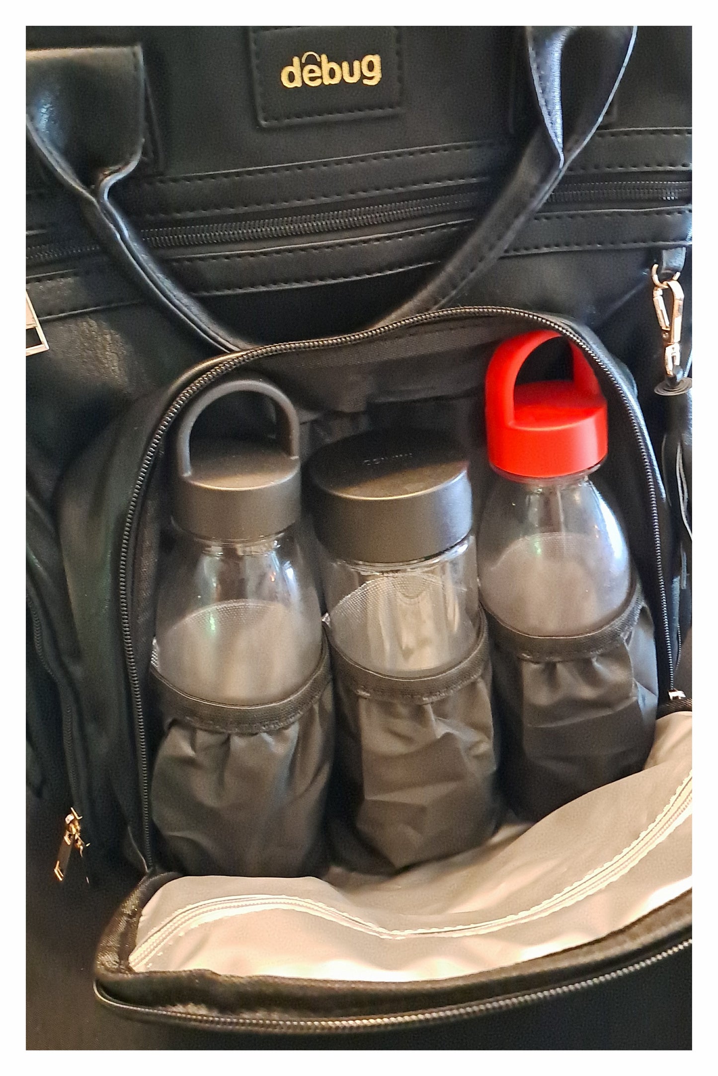 Diaper Bag with Cargo Compartments and Fold-out Changing Pad